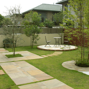 東京都下のアジアンスタイルのおしゃれな庭 (レンガ敷き) の写真