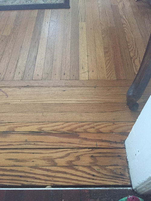 Should we try to match existing hardwood flooring in neighboring room,