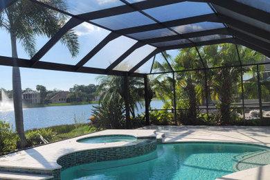 Inspiration for a stone pool remodel in Tampa