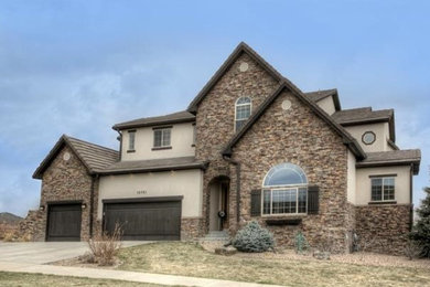 Example of a classic home design design in Denver