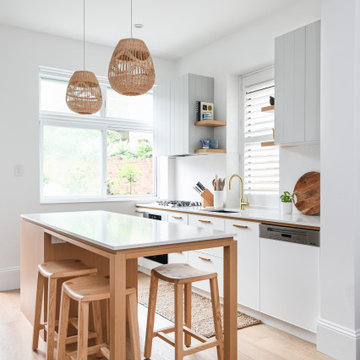 Kitchen with Timber Elements and V-groove Cabinetry