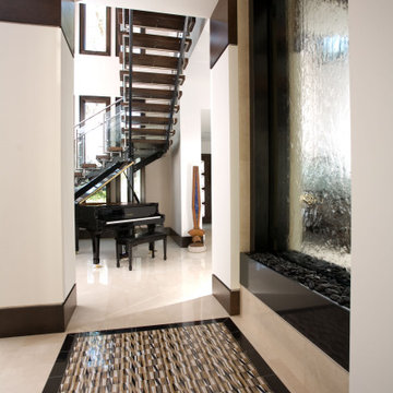Waterfall Hallway Feature with Intricate Floor Design