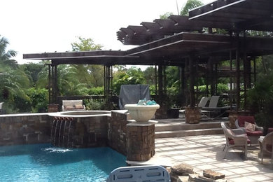 Patio - tropical patio idea in Miami