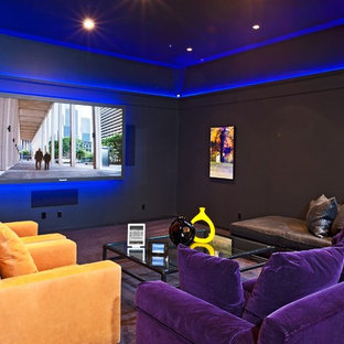 Inspiration for an eclectic enclosed home cinema in Los Angeles with purple floors.