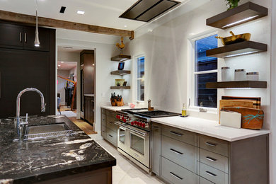 Inspiration for a transitional open concept kitchen remodel in Houston with recessed-panel cabinets, dark wood cabinets, quartz countertops, white backsplash, stainless steel appliances and an island