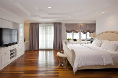 Example of a transitional bedroom design in Other