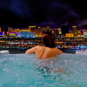 Hot tub with a negative edge city view.
