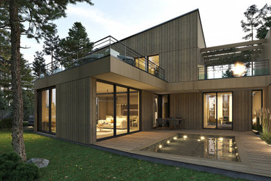 Cette image montre une façade de maison design en bois de taille moyenne et à un étage avec un toit à deux pans, un toit en métal et un toit gris.