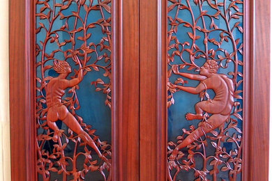 Inspiration for an eclectic double front door remodel in Houston with a medium wood front door