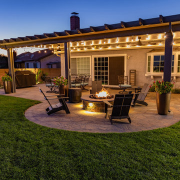 Backyard Patio with Spacious Lawn & Dry Stream Bed