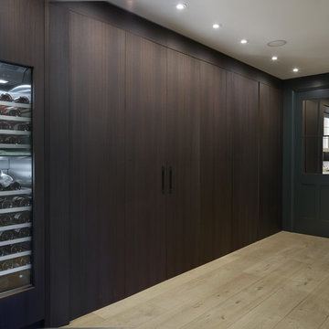 Ultra Contemporary Cabinetry with Hidden Traditional Kitchen Furniture