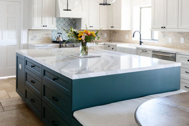 Kitchen - large cottage u-shaped terrazzo floor and beige floor kitchen idea in Phoenix with a farmhouse sink, shaker cabinets, green cabinets, quartz countertops, white backsplash, brick backsplash, stainless steel appliances, an island and white countertops
