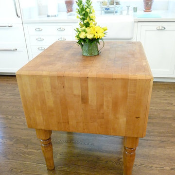 White Kitchen with Butcher Block Island