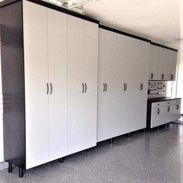 Gray garage cabinets with black trim