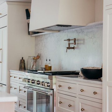 Lakeside Estates Modern Transitional Kitchen Utilizes White Paint with White Oak