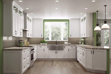 Inspiration for a timeless eat-in kitchen remodel in Atlanta with shaker cabinets and white countertops