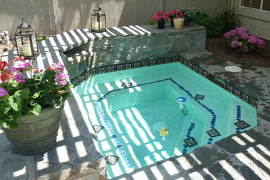 Inspiration for a timeless pool remodel in Orange County