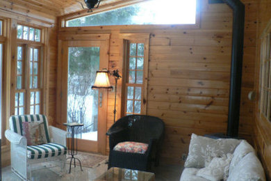 Patio - backyard patio idea in Burlington with a roof extension
