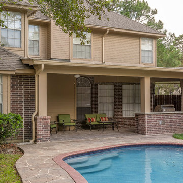 Stone Patio with Outdoor Kitchen and Pool
