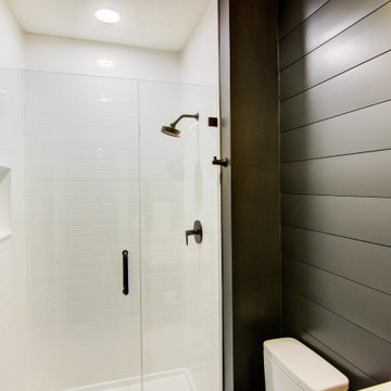 Warm & Inviting Basement Retreat with Kitchenette and Reading Nook