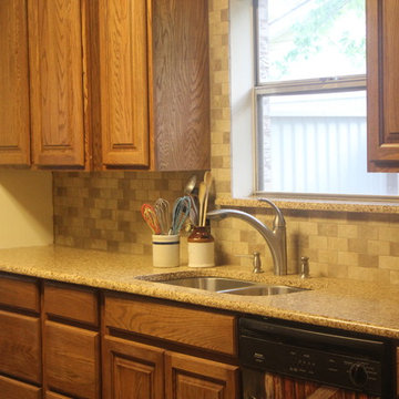 Tawny Oak Cabinets w/Chocolate Truffle Caesarstone and Subway Backsplash