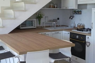 Immagine di una cucina stile shabby