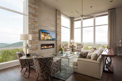 Living room - transitional dark wood floor living room idea in Austin with beige walls, a ribbon fireplace and a wall-mounted tv