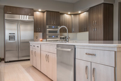 Inspiration for a large contemporary l-shaped eat-in kitchen in Other with an undermount sink, flat-panel cabinets, dark wood cabinets, quartz benchtops, stainless steel appliances, porcelain floors, multiple islands and white floor.