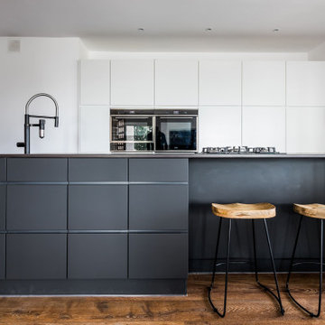 Gran cocina americana abierta al salón de la Casa Telia