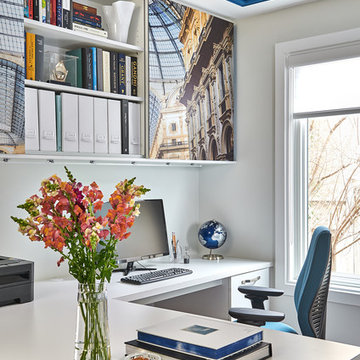 Sliding Art Panel Reveals Office Shelving