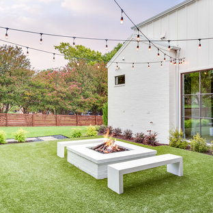 Country full sun garden in Dallas with a fire feature.