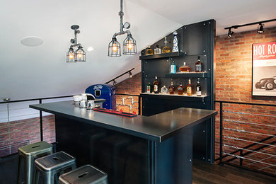 Inspiration for an industrial home bar remodel in Calgary