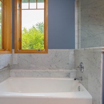 Traditional Carrara Marble Primary Bath Refresh With Maple Vanity