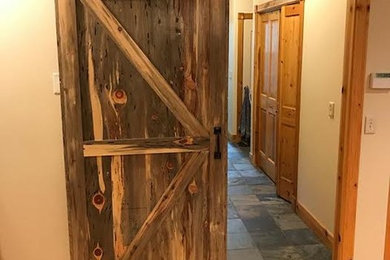 Inspiration for a rustic hallway remodel in Other