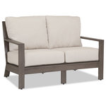 Sunset West Outdoor Furniture - Sunset West Laguna Loveseat With Cushions, Cushions: Canvas Granite - The Laguna collection offers a fresh take on modern living. The unique beauty of each piece and generous scale breathe an inviting personality into this collection. Laguna boasts a wide slat back, smart angles, clean lines and exceptional attention to detail. Laguna offers a generous range of deep-seating and dining pieces in its signature teak-inspired smooth finish, providing you with many options to set the stage for outdoor entertaining and relaxation.