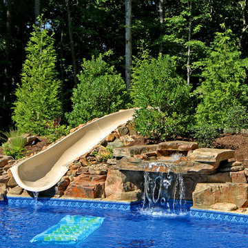 Swimming Pool with Waterfall and Slide