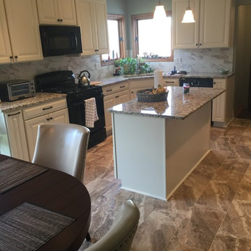 kitchen remodel--antique white cabinets/granite countertops/ceramic floors