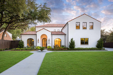 Inspiration for a mediterranean exterior home remodel in Dallas