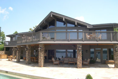 Example of a large transitional brown two-story wood exterior home design in Nashville with a shingle roof