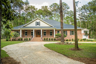 Example of a large classic two-story brick exterior home design in Atlanta