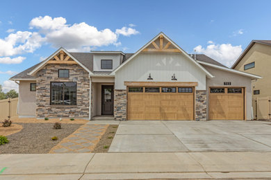 Mid-sized craftsman gray one-story mixed siding and board and batten house exterior idea in Other with a hip roof, a shingle roof and a gray roof