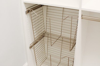 Example of an arts and crafts closet design in Atlanta
