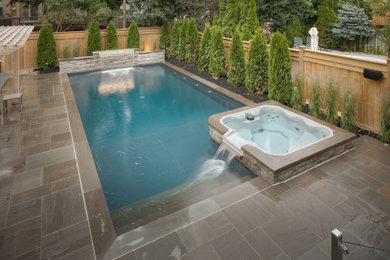 Inspiration for a contemporary pool remodel in Toronto
