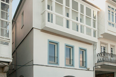 Inspiration for a transitional exterior home remodel in Other
