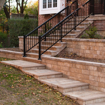 Custom Front Entrance Stonework & Retaining Wall Landscape Design