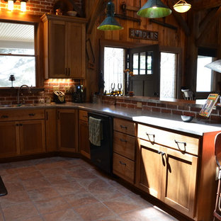 Design ideas for a mid-sized country u-shaped kitchen pantry in Indianapolis with an undermount sink, shaker cabinets, brown cabinets, solid surface benchtops, red splashback, terra-cotta splashback, stainless steel appliances, ceramic floors and a peninsula.