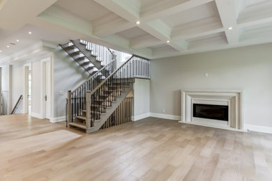 Large minimalist open concept living room photo in Toronto