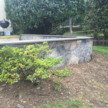Irregular Flagstone Patioin Silver Spring MD With Stone Sitting Walls