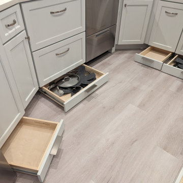 Small kitchen with storage options in toe kick
