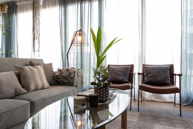 Living room - tropical living room idea in Delhi